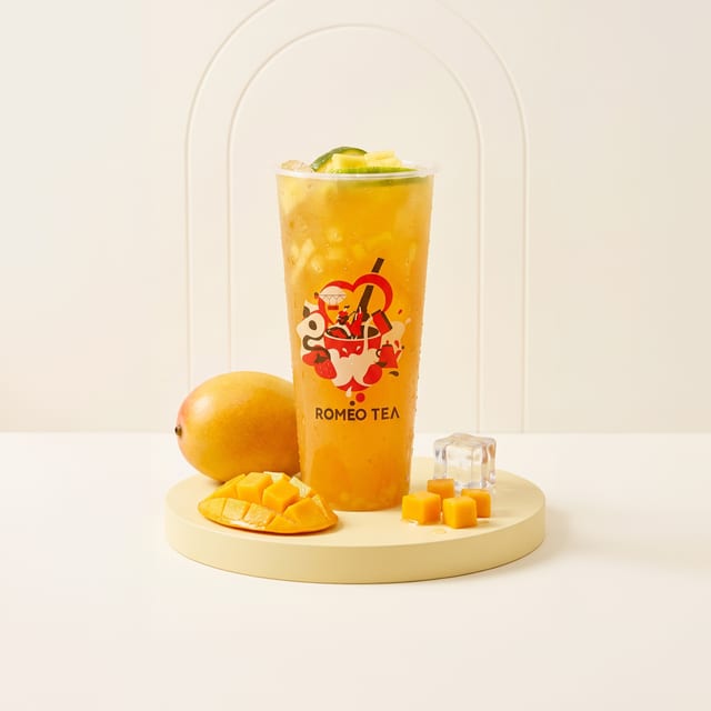 Hand Crushed Mango Iced Jasmine Green Tea.